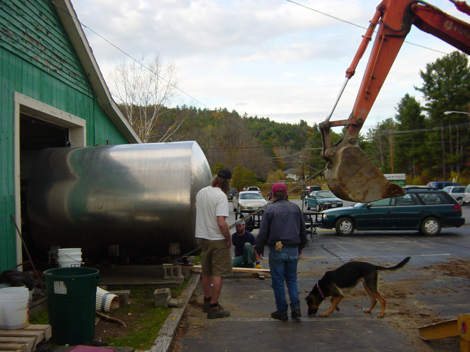 Pulling the fermentation tanks out with an excavator